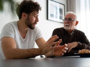 serious conversation between men