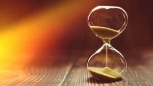 hourglass on a wooden background 2026 03 09 09 19 45 utc