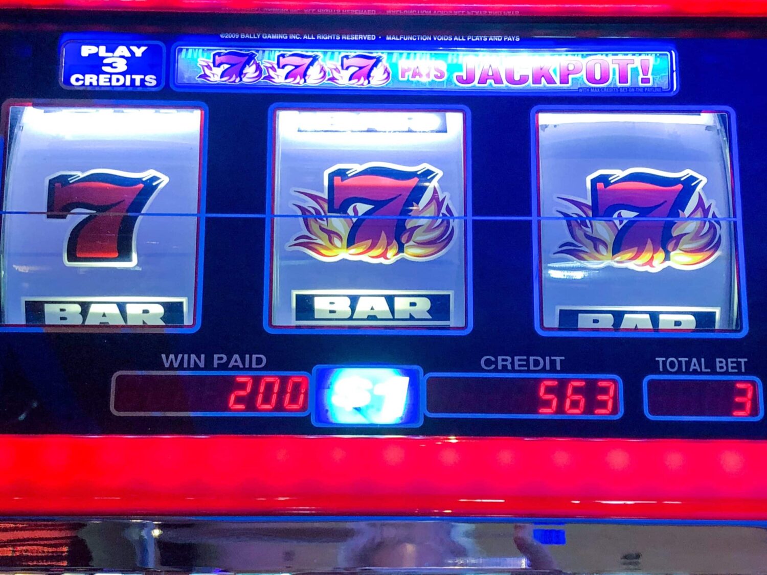 slot machine jackpot with three red sevens 2026 01 07 06 30 43 utc scaled e1781123516770
