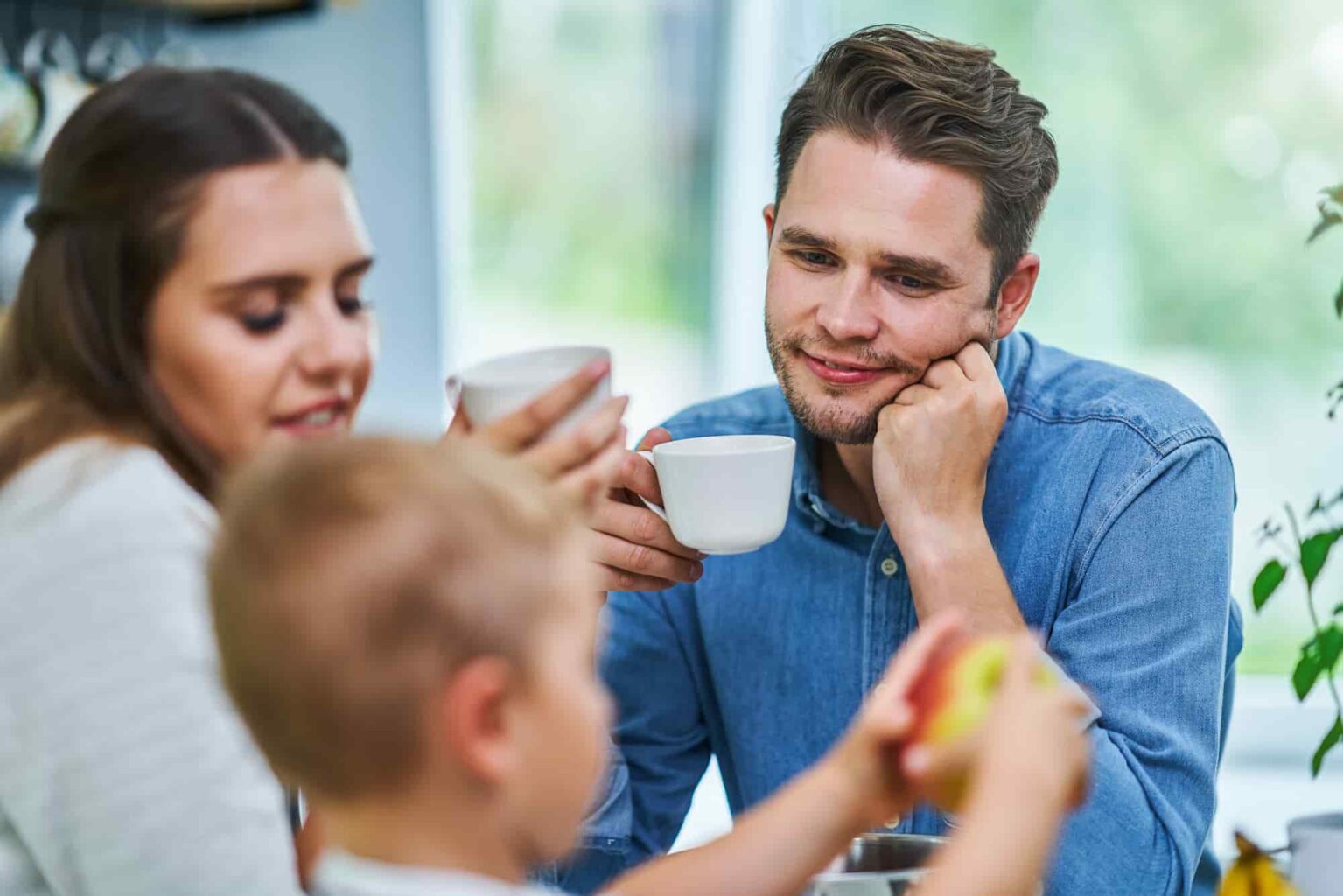 young family enjoying coffee time together at home 2026 03 17 14 46 06 utc 1