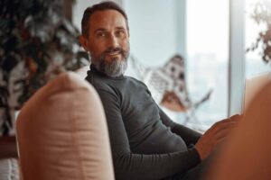 man relaxing at home with laptop 2026 09 22 17 28 19 utc 1 e1790160983187